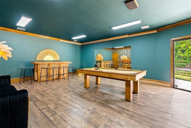 rec room featuring ornamental molding, hardwood / wood-style floors, and billiards