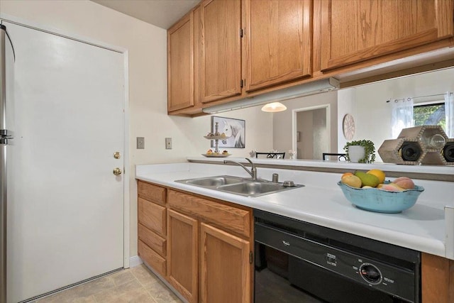 kitchen with black dishwasher and sink