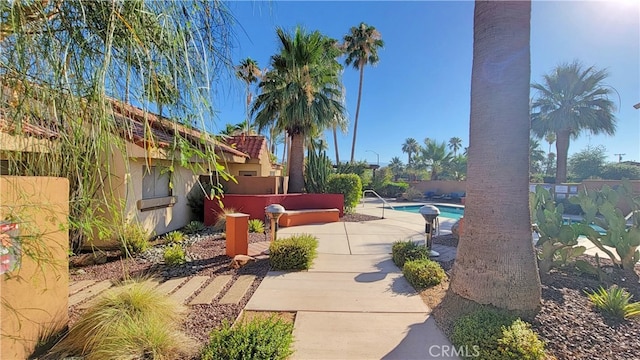 view of patio with a fenced in pool