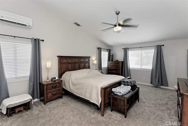 carpeted bedroom featuring lofted ceiling, a wall unit AC, and ceiling fan