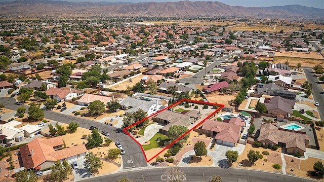 aerial view featuring a mountain view