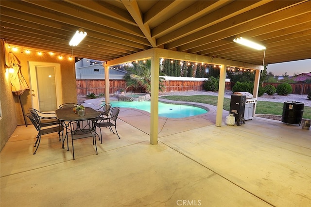 view of swimming pool featuring a patio