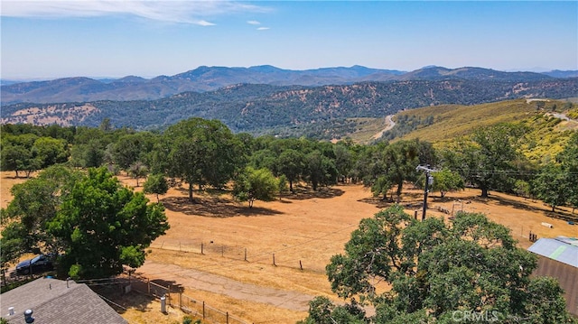 view of mountain feature with a rural view