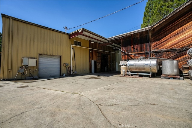 view of property exterior with a garage