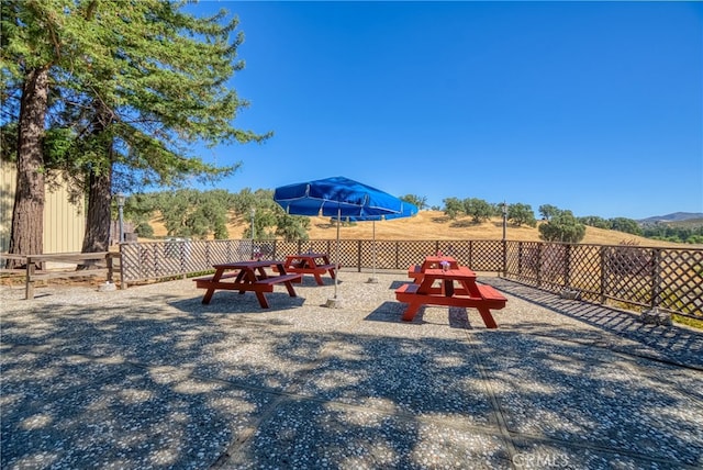 view of playground featuring a mountain view