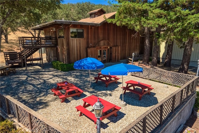 exterior space with a patio and an outdoor fire pit