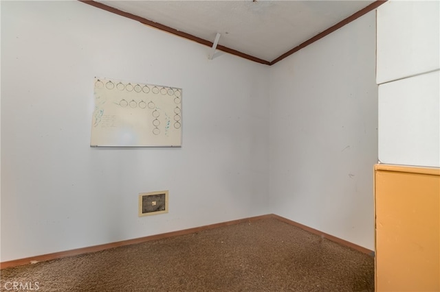 spare room with carpet and lofted ceiling