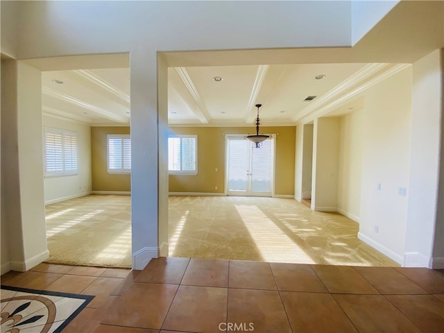 carpeted empty room featuring ornamental molding, beamed ceiling, and french doors