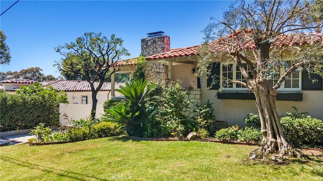 exterior space with a front lawn