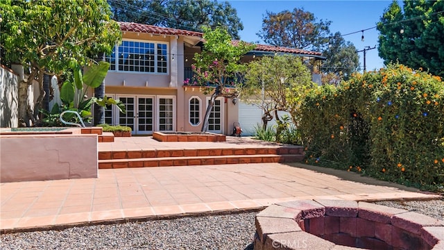 view of patio / terrace featuring french doors