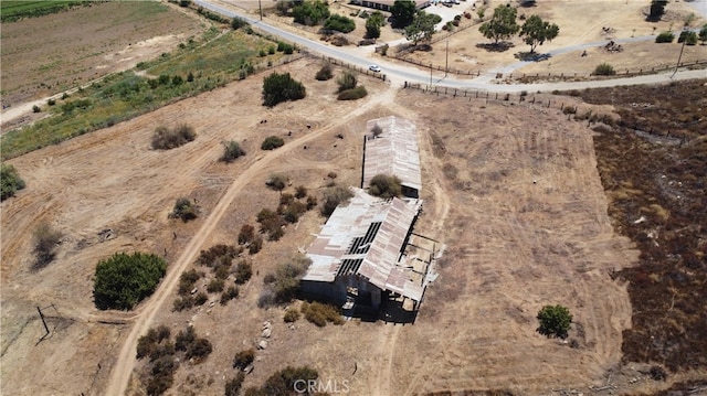 birds eye view of property featuring a rural view