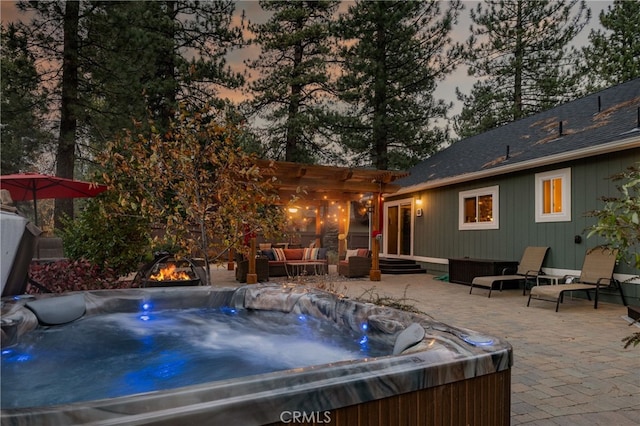 pool at dusk featuring a pergola, a patio area, and a hot tub