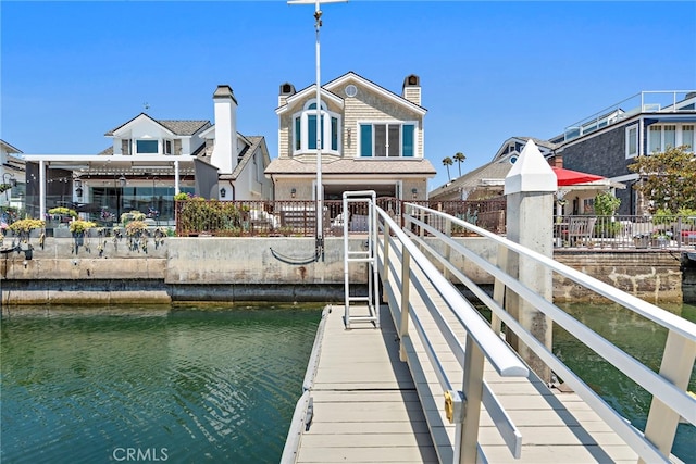 view of dock with a water view