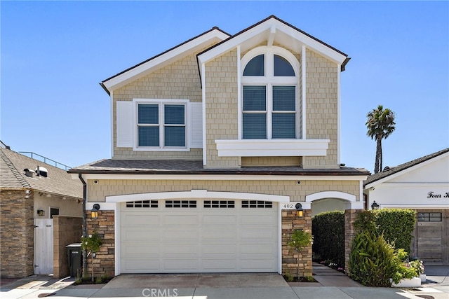 view of front of home with a garage