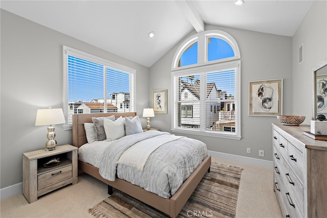 bedroom with light colored carpet and lofted ceiling with beams