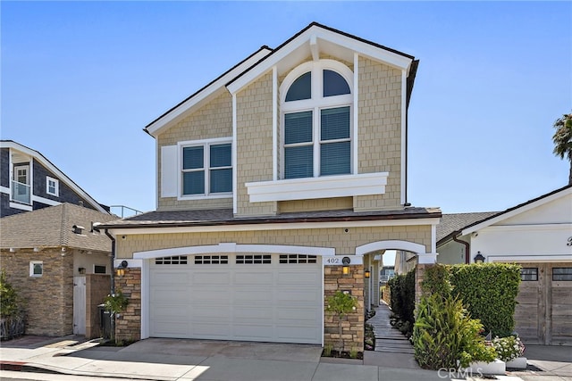 view of front of property with a garage