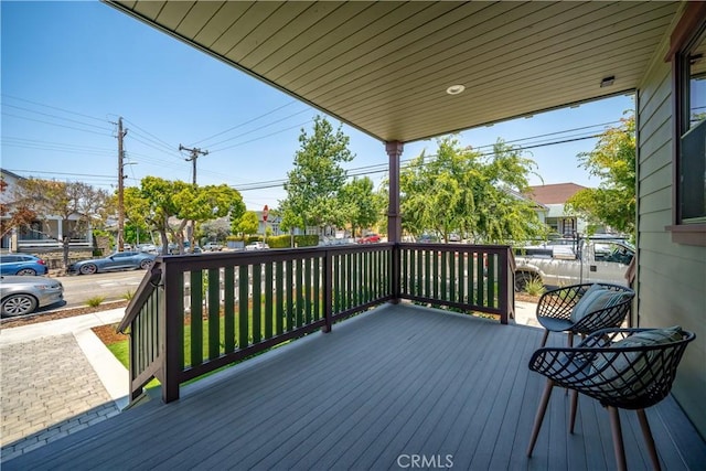 wooden deck featuring a porch