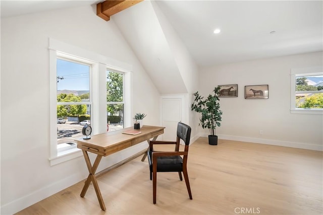 home office featuring lofted ceiling with beams and light wood-type flooring