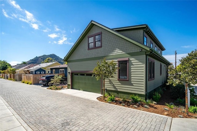 view of front of property with a mountain view