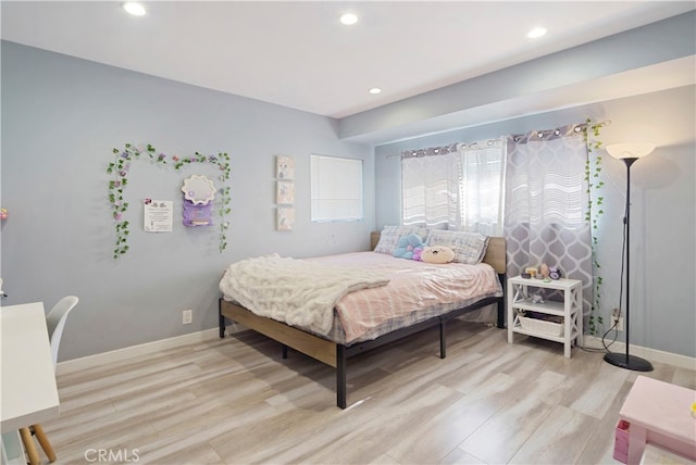 bedroom featuring light hardwood / wood-style floors