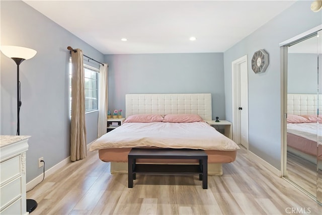 bedroom featuring light hardwood / wood-style flooring