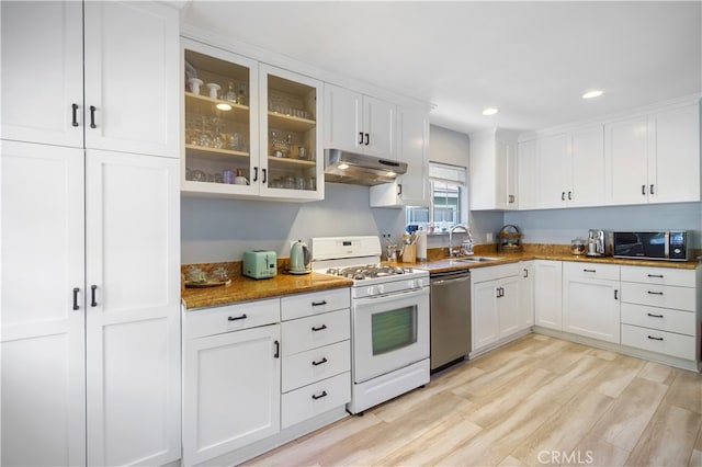 kitchen with white cabinets, dishwasher, white range with gas stovetop, and sink