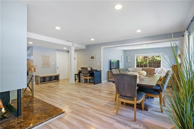 dining room featuring light hardwood / wood-style floors