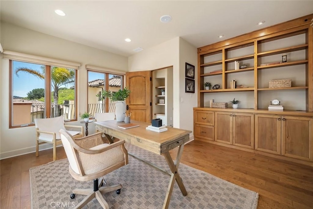 home office featuring dark wood-type flooring