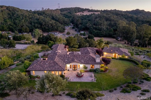 view of aerial view at dusk