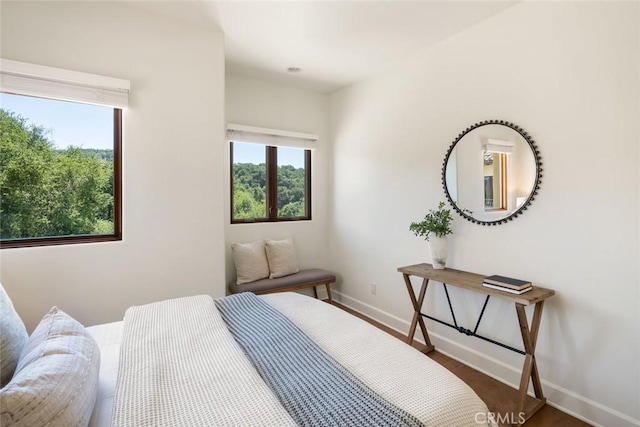 bedroom featuring dark hardwood / wood-style flooring