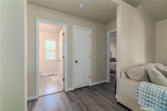 living area with hardwood / wood-style floors