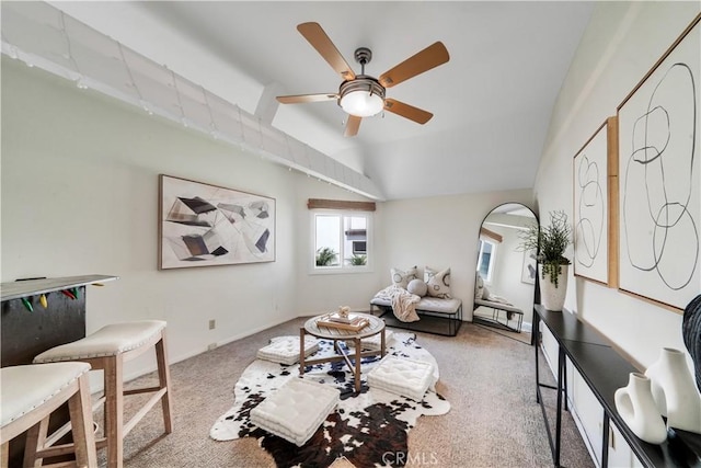 sitting room with light colored carpet, ceiling fan, and lofted ceiling