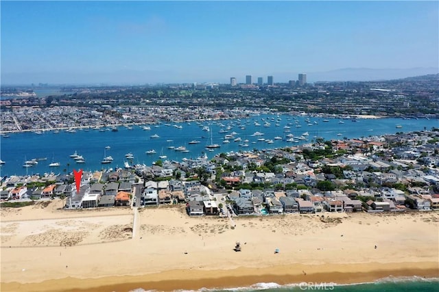 bird's eye view with a beach view and a water view