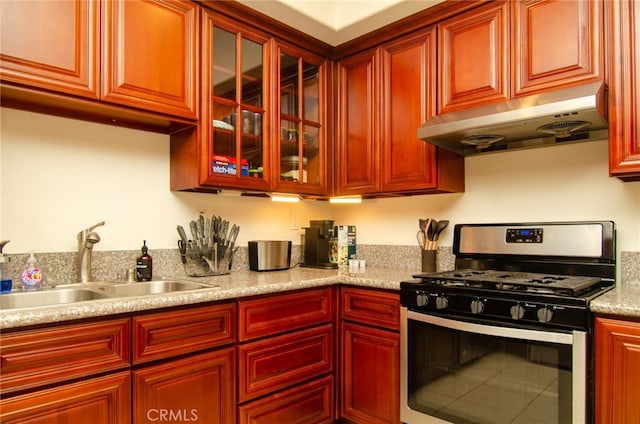 kitchen featuring sink and stainless steel range with gas stovetop