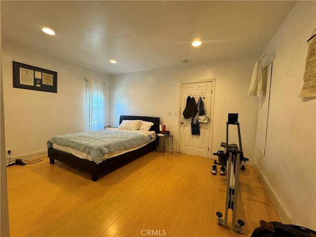 bedroom featuring wood-type flooring