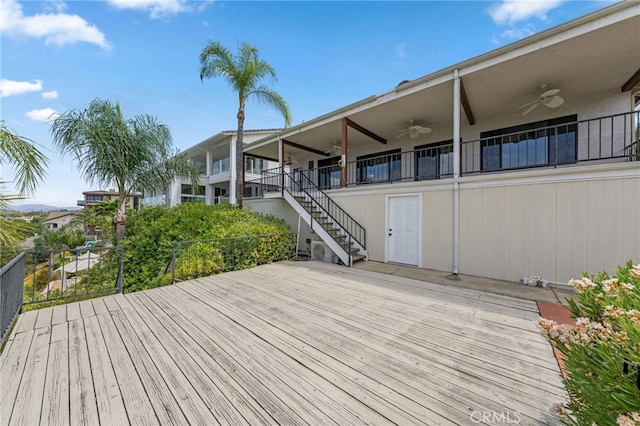 wooden deck with ceiling fan