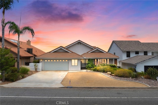 view of front of home with a garage