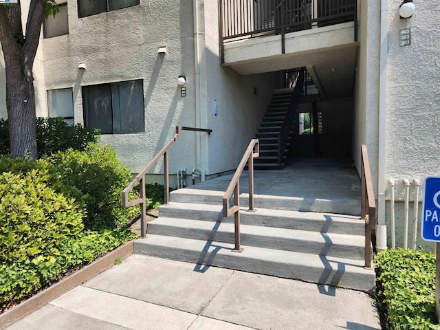 property entrance with a balcony