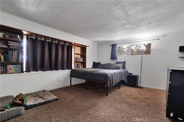 bedroom with carpet flooring, a textured ceiling, and crown molding