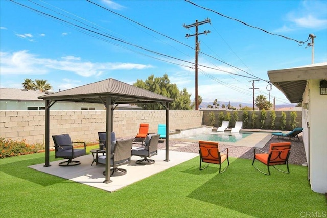 view of patio featuring a fenced in pool