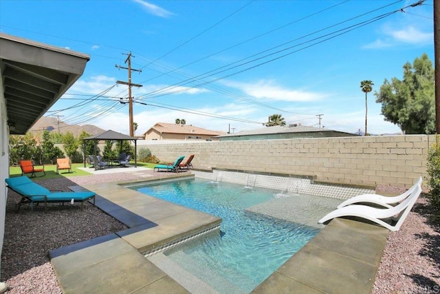 view of pool featuring a patio and pool water feature