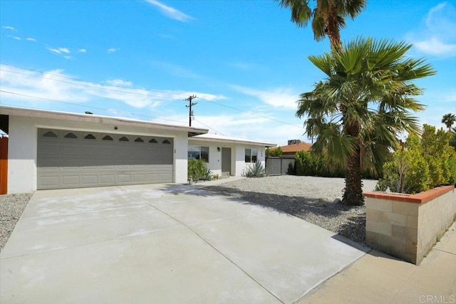 single story home with a garage