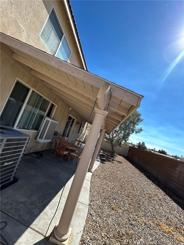 view of patio featuring cooling unit