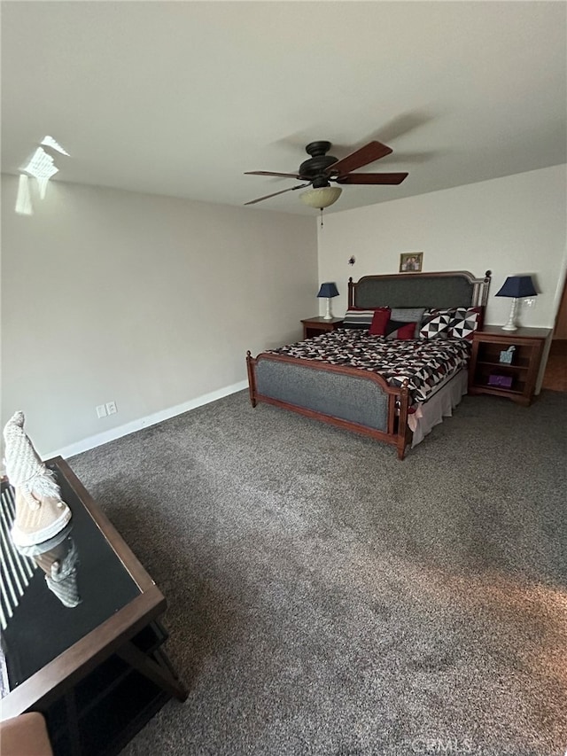 bedroom featuring ceiling fan and carpet floors