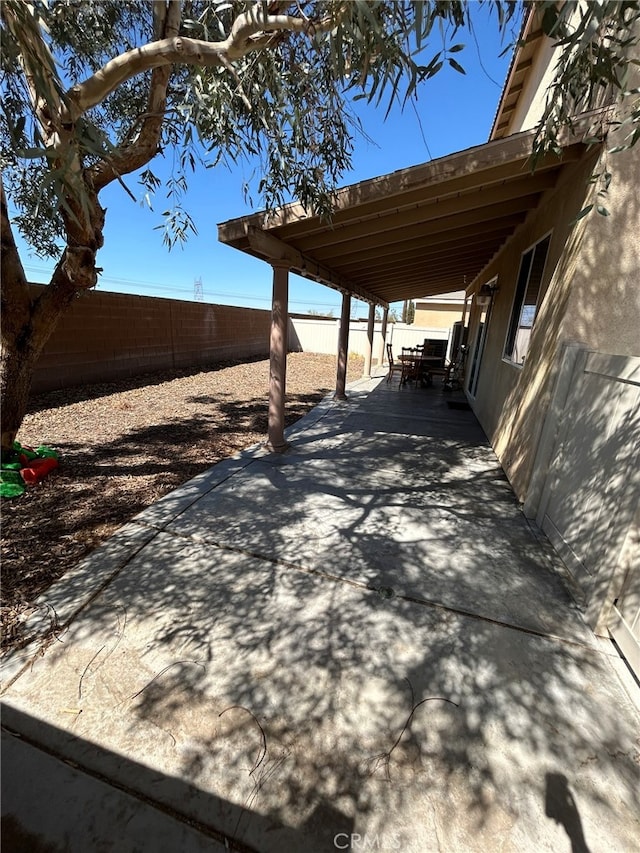 view of patio featuring a carport