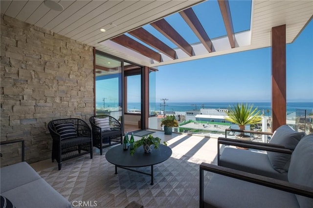 view of patio featuring an outdoor hangout area, a water view, and a pergola