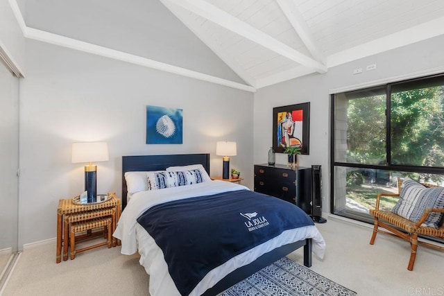 carpeted bedroom with beam ceiling and high vaulted ceiling