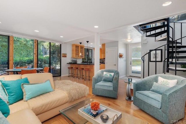 living room with light hardwood / wood-style flooring