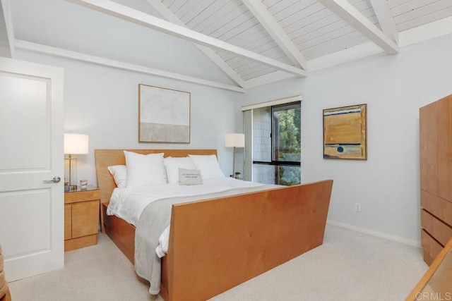 bedroom with vaulted ceiling with beams, wooden ceiling, and light colored carpet