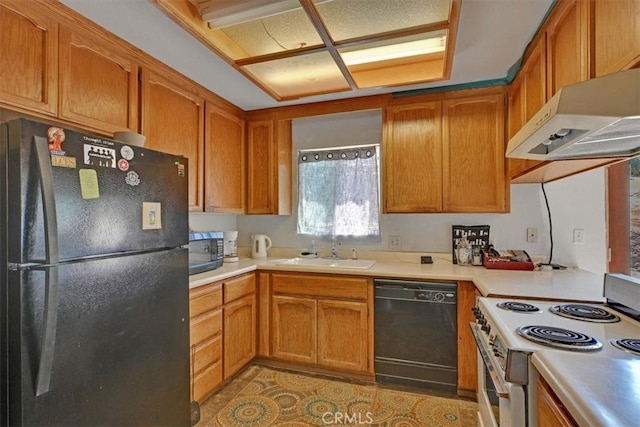 kitchen featuring black appliances and sink